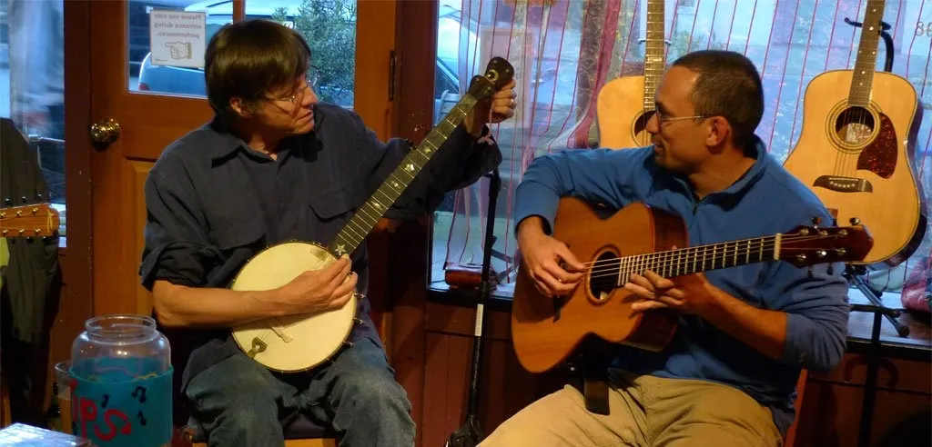 Playing a tune with Steve Baughman on banjo